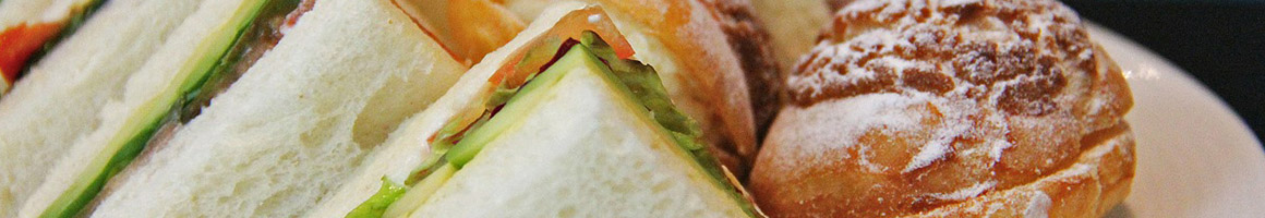 Eating Sandwich Peruvian at Cafe Rumba restaurant in Bellingham, WA.